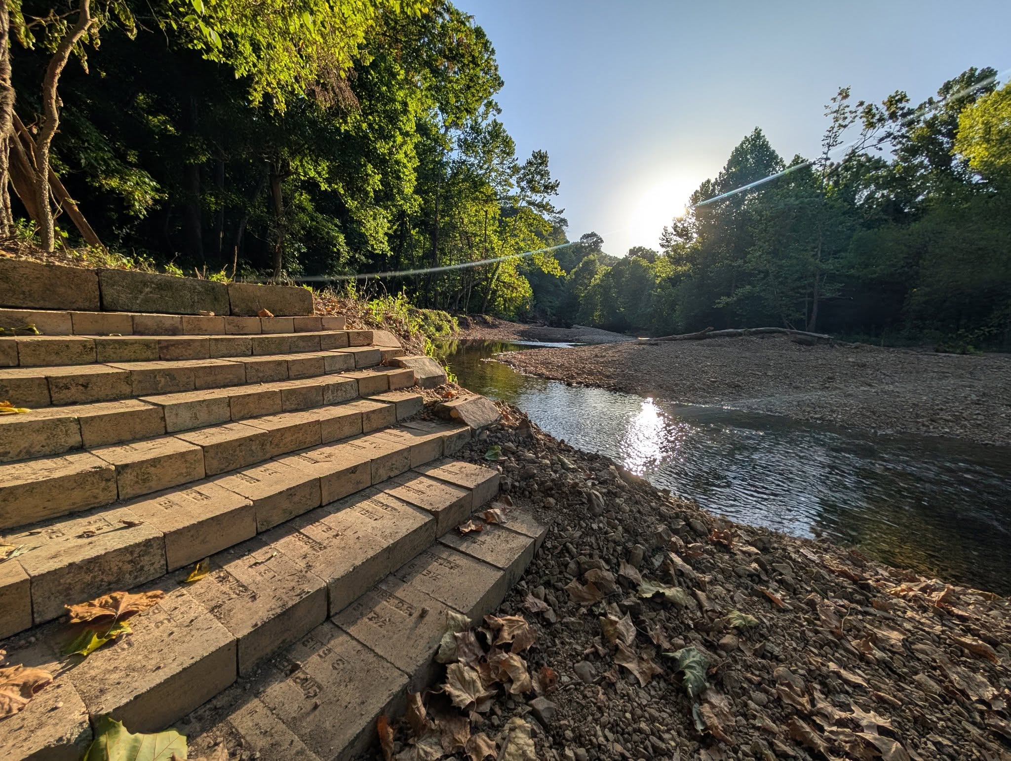 Outdoor steps beside a creek