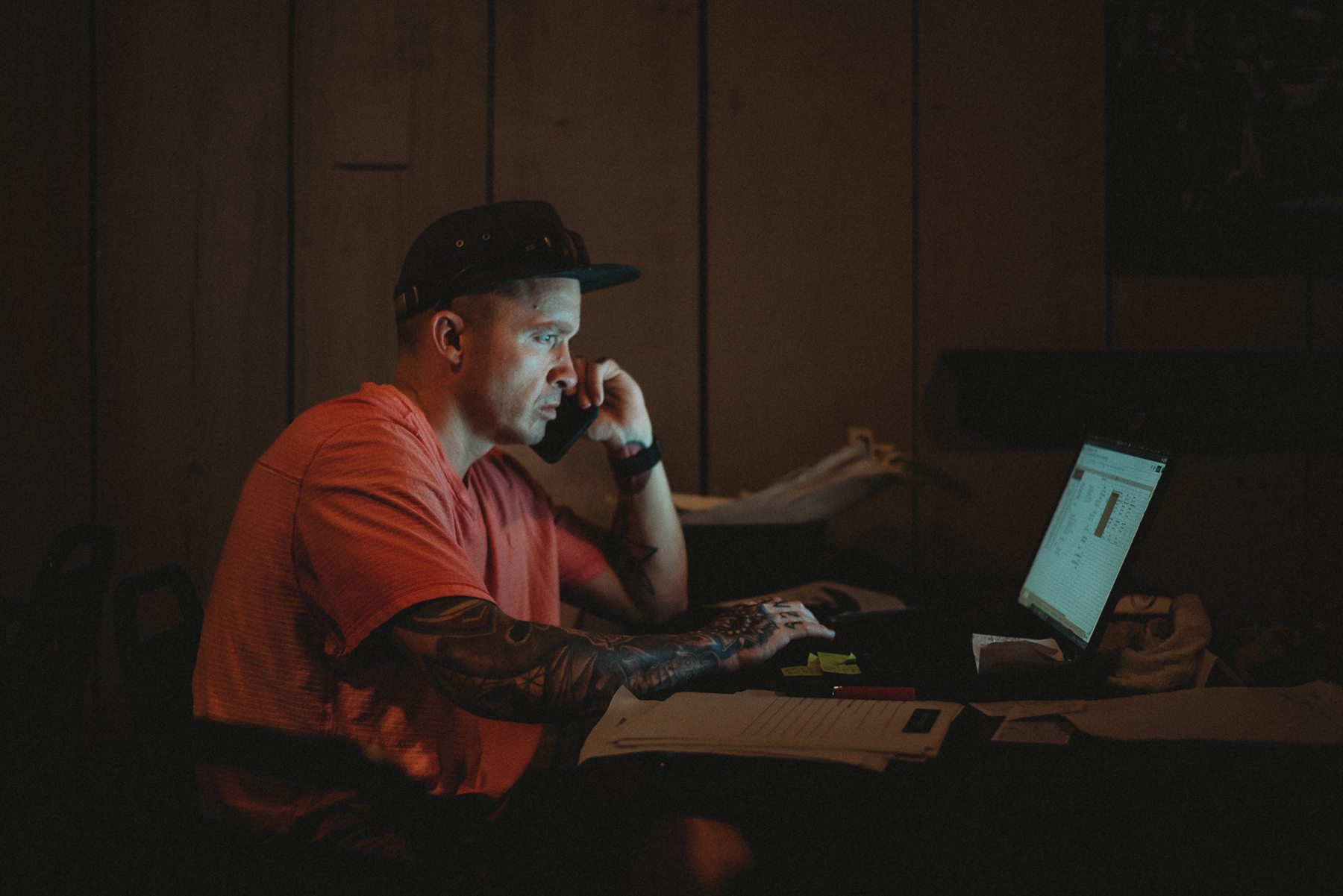 Jon Thomas Buck working at a desk